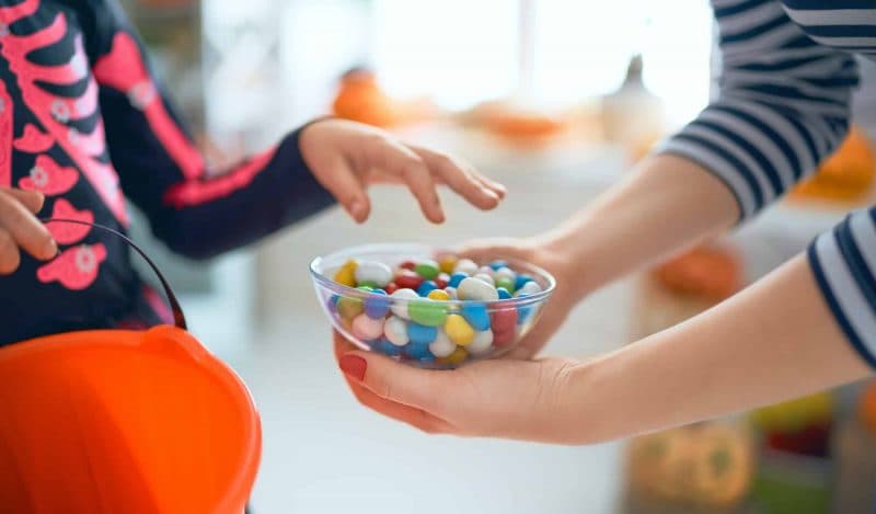 Child is taking sweets.