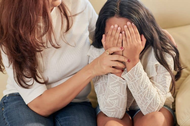 child-crying-mum-comforting