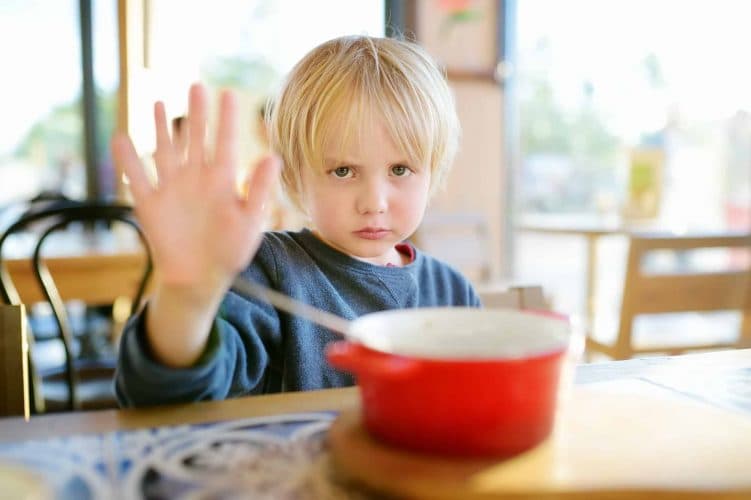 child saying no to food