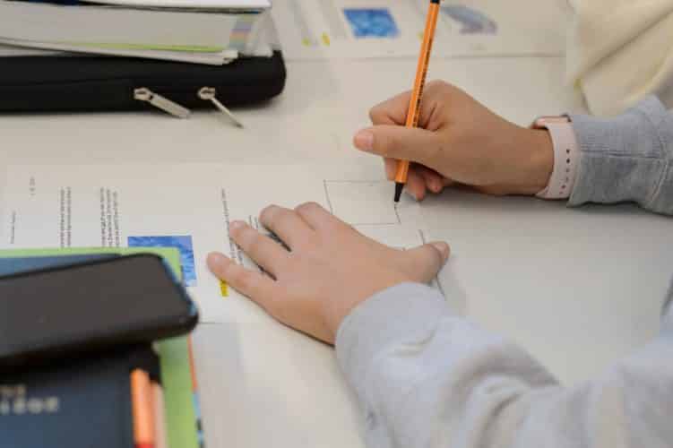 Kid’s hands writing