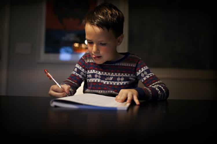 Kids doing handwriting homework