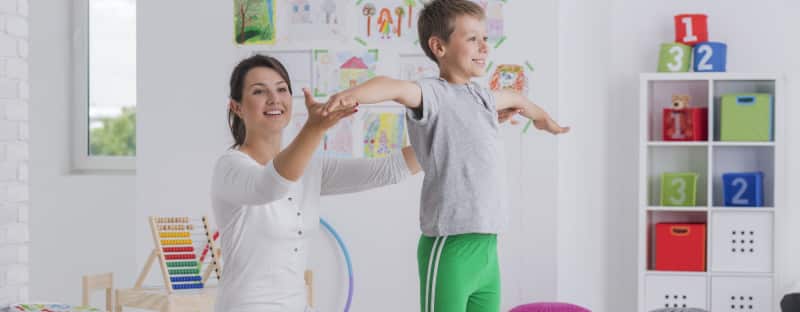 Boy doing physical exercises
