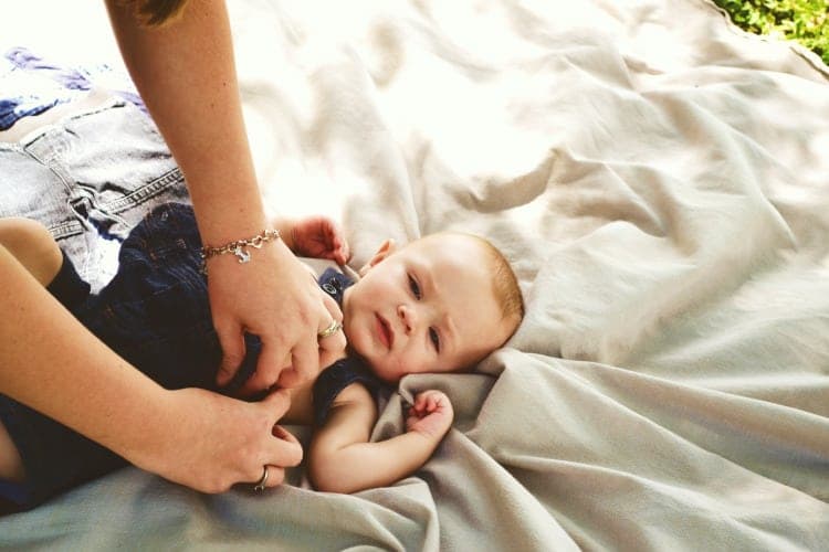 baby laying onesie