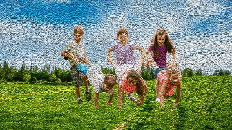 kid walking on hands wheelbarrow racing