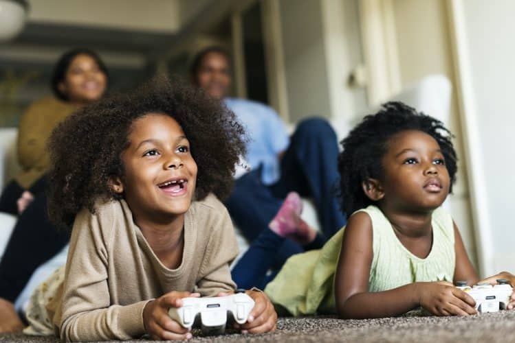 African children playing video games