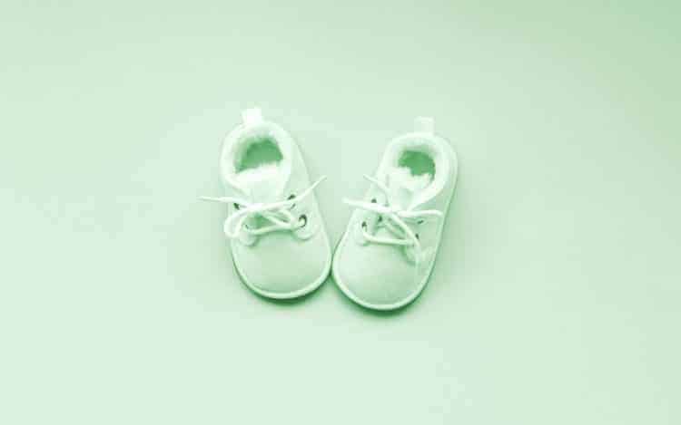 Children's shoes for girls, stands on neo mint background.